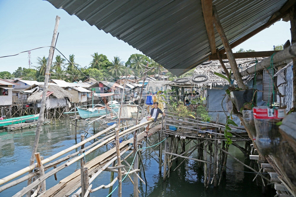 Pfahlhäuser in Puerto Princesa, Philippinen, 16.02.2016